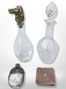 A glass decanter with cast brass stopper in the form of a Spaniel, height 31 cm,