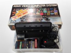 An Atari video games system with joy stick,