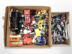 A box of die cast vehicles,