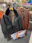 A Fatigue black leather jacket, a further brown leather jacket,