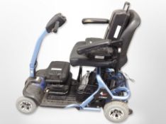 A Liteway mobility scooter with charger and several battery packs