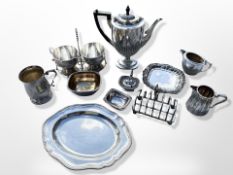 A group of silver plated wares, large teapot, seven bar toast rack, tankard,