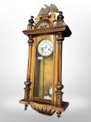 A Junghans walnut eight day wall clock with enamelled dial,