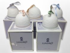 Five Lladro bells, boxed.