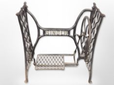 A cast iron Singer sewing machine treadle base,