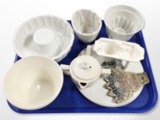 A 19th century Maling creamware jelly mould, several further moulds,