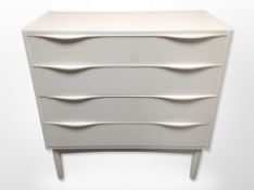 A Danish painted pine and play wood four drawer chest,