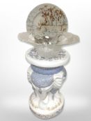 A ceramic elephant plant stand, height 48 cm,