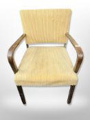 A continental oak framed armchair