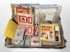 A box containing Hanako miniature Japanese dolls and clothing,