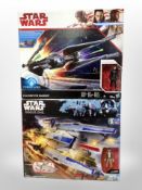 Two Hasbro Star Wars models, Kylo Ren's Tie Silencer, and Rebel U-Wing Fighter.