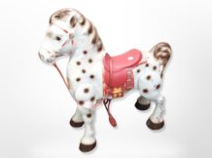 A 20th century child's tin plated Mobo Bronco ride-on horse,