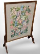 An oak tapestry fire screen,
