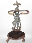 A Victorian cast iron umbrella stand,