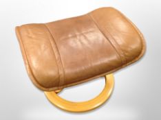 A Norwegian Ekornes stitched tan leather footstool