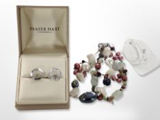 A pair of silver crystal hoop earrings and two silver mounted bracelets