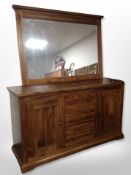 A contemporary stained pine sideboard,