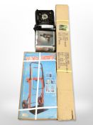 A boxed ladder brace, further folding transporter in box,
