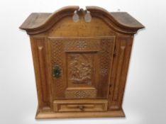A 19th century Scandinavian carved oak wall cabinet,