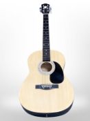 A Martin Smith acoustic guitar in soft carry bag