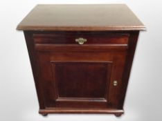 A reproduction mahogany cabinet,