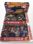 Three Hasbro Transformers figures,