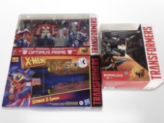 Three Hasbro Transformers figures,