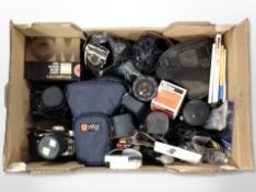 A box of vintage and later cameras, lenses,