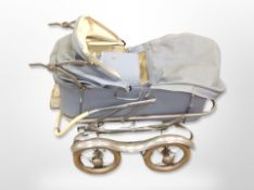 A mid 20th century folding pram