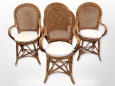 Four wicker armchairs