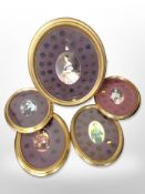 Five gilt framed montages of pennies from the reigns of various British Monarchs,