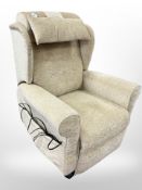 A contemporary electric reclining armchair