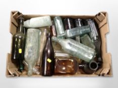 A box of antique glass bottles, some Newcastle,