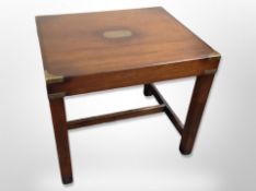 A mahogany brass mounted lamp table,