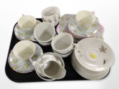 Seventeen pieces of Shelley Primrose Chintz tea china and twenty pieces of Royal Doulton Tumbling