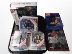 Four Disney Marvel figures,