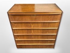 A 20th century Danish teak and pine six drawer chest,