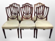 A set of six reproduction mahogany shield back dining chairs