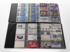 Two albums of assorted special edition and other phone cards