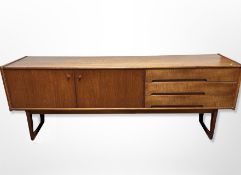 An A Younger Ltd teak low sideboard,