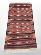 A Kilim rug,