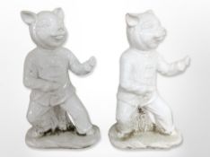 A pair of Chinese crackle-glazed porcelain figures of pigs in martial arts pose, height 39cm.