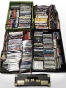 A large quantity of CDs and DVDs, and a Goodmans portable record player, in case.
