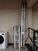 A garden pavilion contained in two boxes.