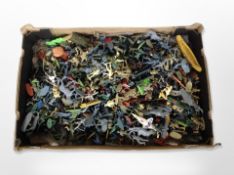 A large quantity of plastic soldiers and other figures.