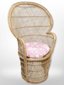 A wicker 1980's peacock chair,