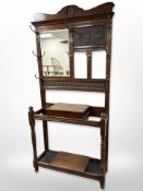 A late Victorian walnut hall stand,