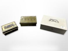 Three vintage enamelled metal cash tins, largest 26cm wide, two with keys.