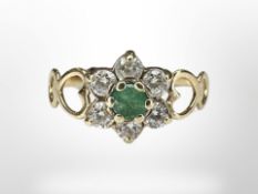 A 9ct yellow gold emerald and cubic zirconia dress ring