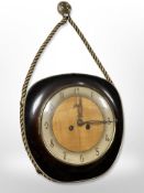 A Schatz hanging wall clock, case 24cm wide.